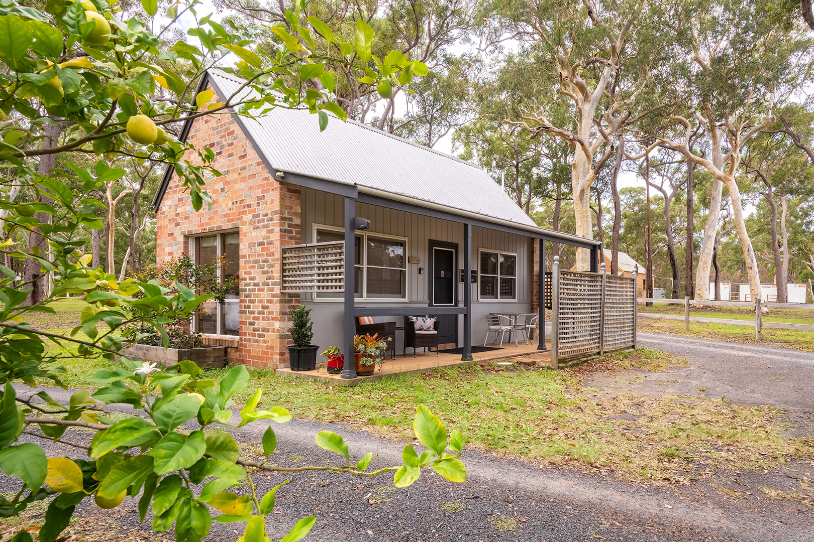 Light-filled cottage retreat in Jervis Bay surrounded by bushland, perfect for a relaxing coastal stay
