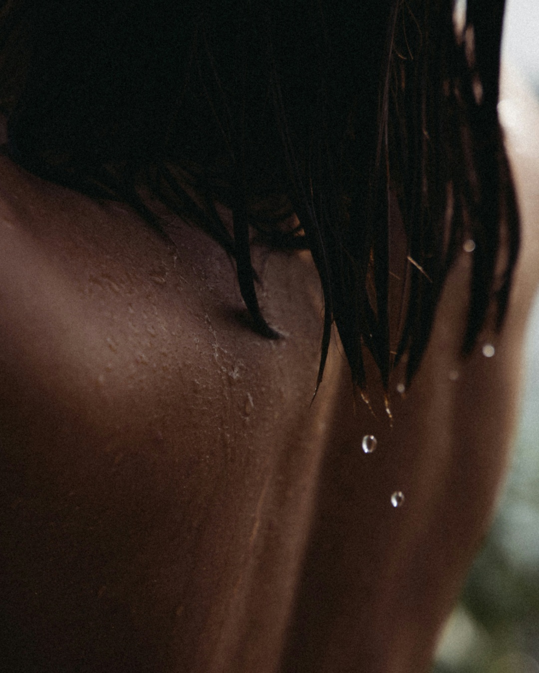 Water droplets on wet hair and skin